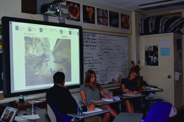 Sophomores Jonah Thomas, Alara Ozdogan, and Catherine Scott write down their best guesses. Photo by Marley Orange.