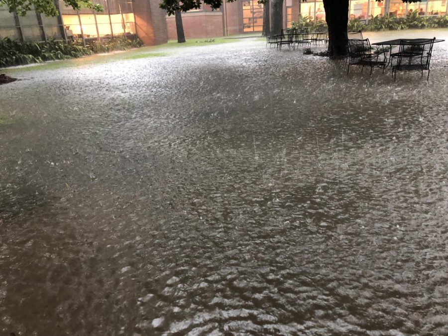 Torrential rain fell for hours on campus, causing water to flow into areas of the Upper School.