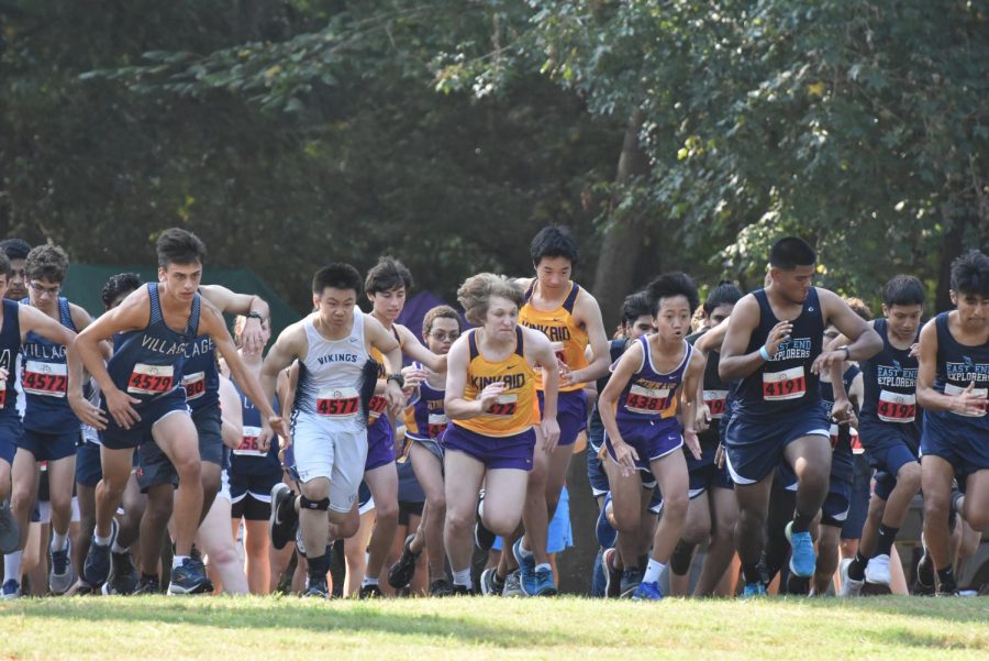 Members of Kinkaids boys cross-country team during the Cooper Dragon Invitational in Tomball, Texas last August. Boys cross country and girls cross country both compete on Saturday morning in the Cypress-Tomball area. Photo by David Shutts
