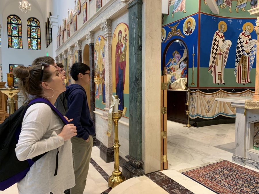 Mrs. Jessica Hawkes, a history teacher in the Upper School, admires the walls of the Annunciation Greek Orthodox Church in Houston.