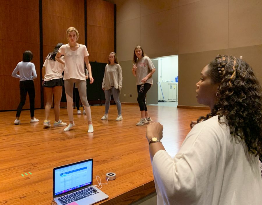 Mrs. Danyale Williams, a dance teacher in the Upper School, runs through an American folk dance with her students after helping them fine tune the steps. The students were taking Mrs. Williams Interim Term Class called Lets Dance Around the World.
