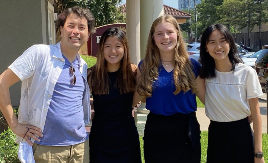Debate coach Eric Emerson, Allison Yang, Samantha Fowler and Katherine Zhang pose. Allison Yang competed in International Extemporaneous Speaking. Kinkaids policy team of Samantha Fowler and Katherine Zhang finished in the top 25 teams in the country at the NSDA tournament. 