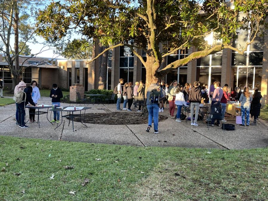 Students and faculty congregated in the library courtyard.
