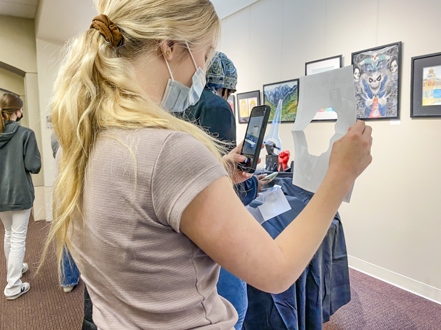 Camille Dunn, a junior, working on an activity featuring the work of artist Georgia O’Keeffe. Activity