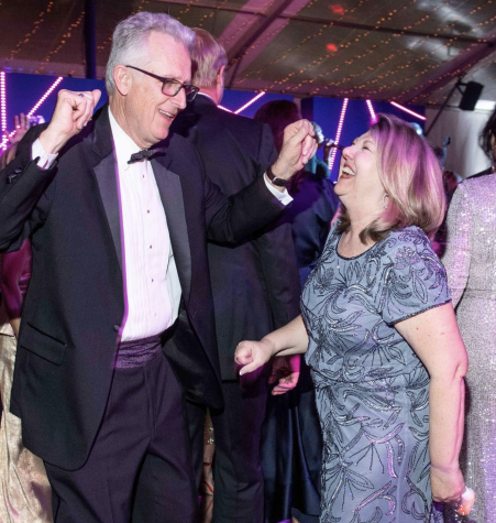Mr. Moore and his wife bust a move on the dance floor during the auction.