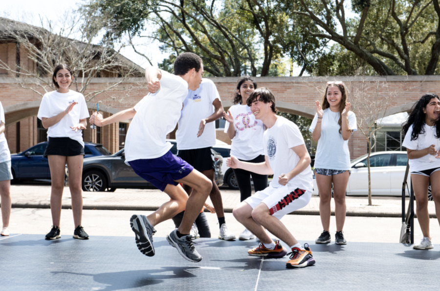 Senior John Richards and junior Kevin Goerl engage in a dance-off during the bhangra performance.