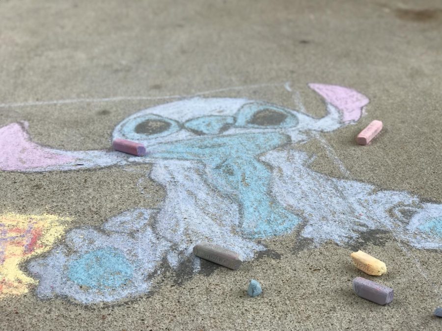 Freshman Ray Tian created chalk art of Stitch from Lilo and Stitch.