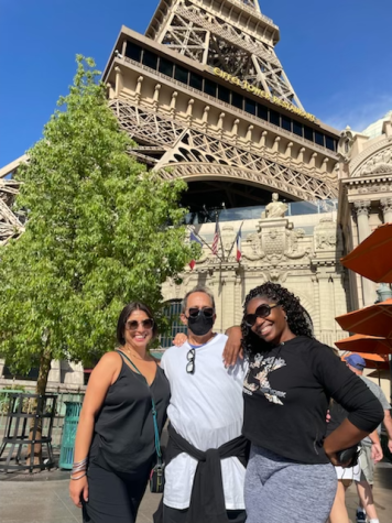 Ms. Cable, Mr. Girlinghouse, and Mrs. Williams pose in Vegas.