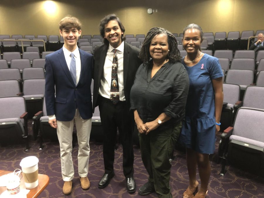 Prof. Annette Gordon-Reed poses with juniors Henry Wizel, Eshaan Mani, and Ava Wizel, who gave her a tour of the school.