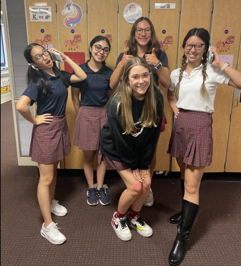 A group of senior girls pose in their Maverick attire.