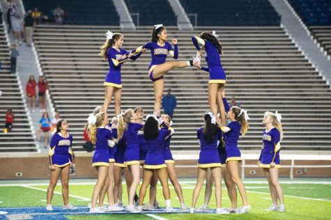Cheerleaders soar high at St. John’s game