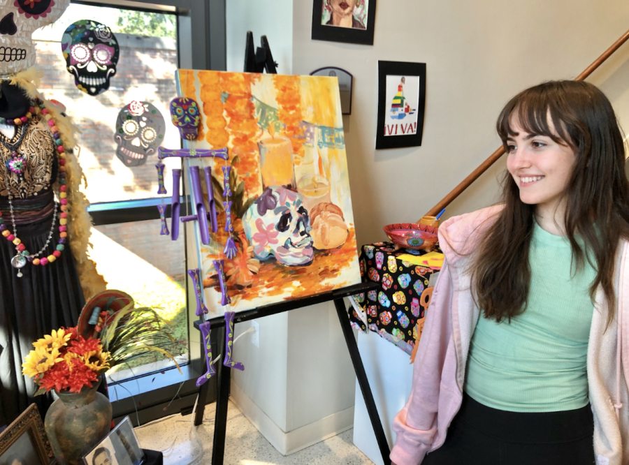 Sophomore Cami Culbertson admires the "ofrenda" on campus.