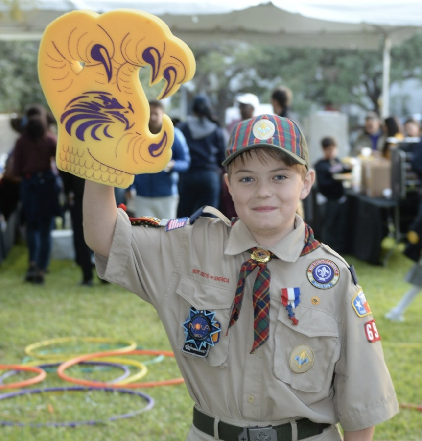 Middle school student David Suttles shows off his foam Falcon talon.