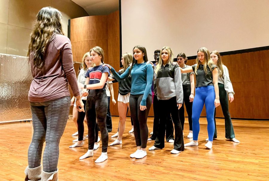 Dance teacher Mrs. Anjaly Thakkar, who normally teaches math in the Upper School,  helps direct a dance routine to the song "Problem" by Ariana Grande that features her entire class. The dancers were enrolled in Mrs. Thakkar's "Inspired Choreography" class during Interim Term.