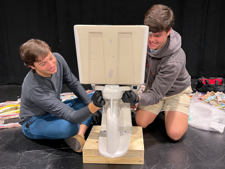 Juniors Oliver Eades and Hudson Holthouse work side by side to fix and put together a toilet. The first main project of the "Fixer Upper" class was repairing a toilet and learning about the different parts of its structure. 