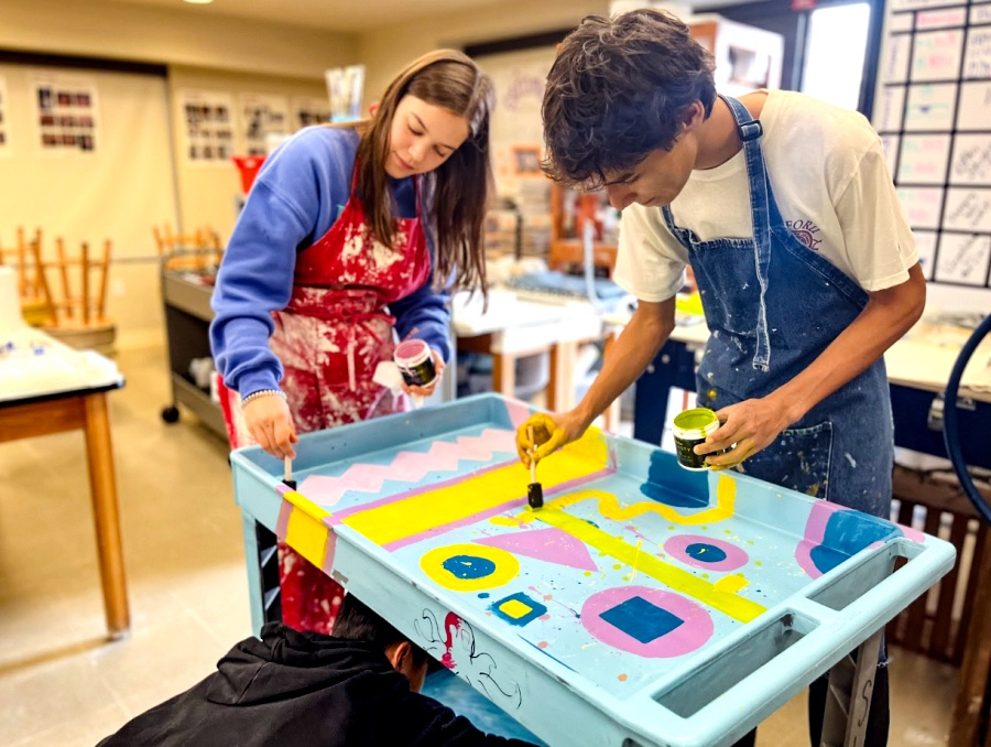 Students work on a “fun cart” to be donated Texas children’s hospital.