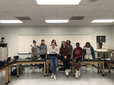 Esports club members smiling at their meeting on March 21.