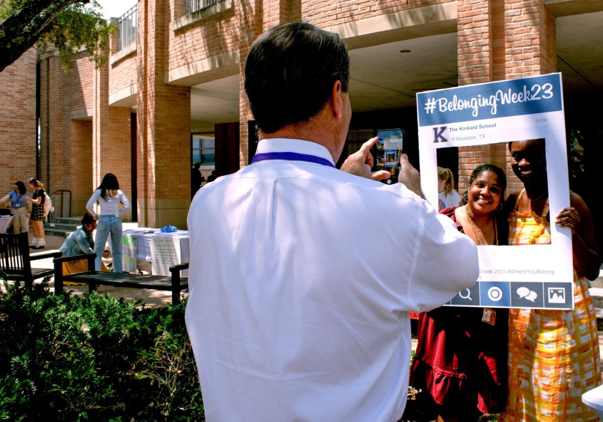 Head of School Jonathan Eades stops to snap a fun photo of Mrs. Erica Baker, Coordinator of Student Life and Engagement at Club Fair.