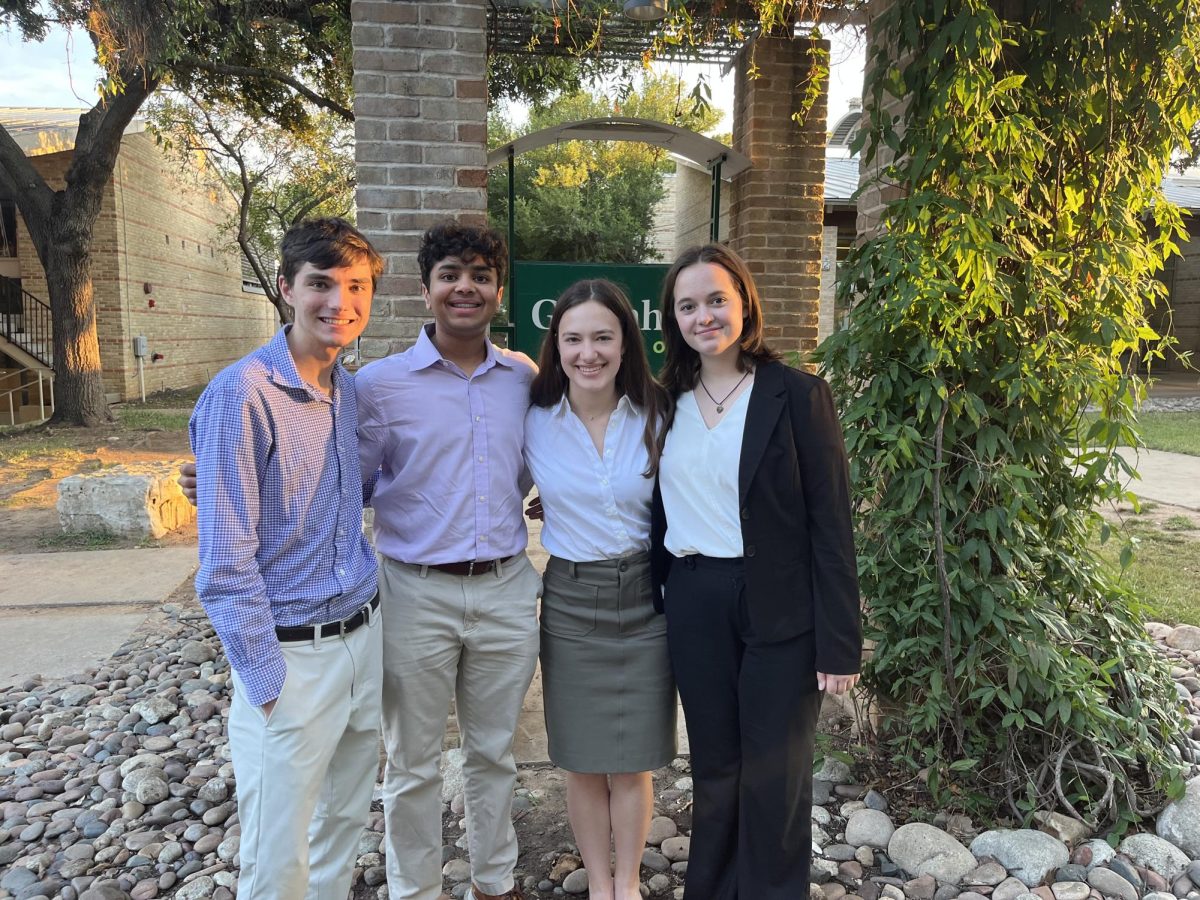 The World Schools Debate team composed of seniors Wills Leighton, Kaveen Shah and Catherine Moursund, as well as junior Caroline Pielop, at a tournament in Dallas.