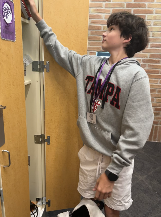 Freshman Lucas Cohen wears a lanyard in order to display his falcon card.