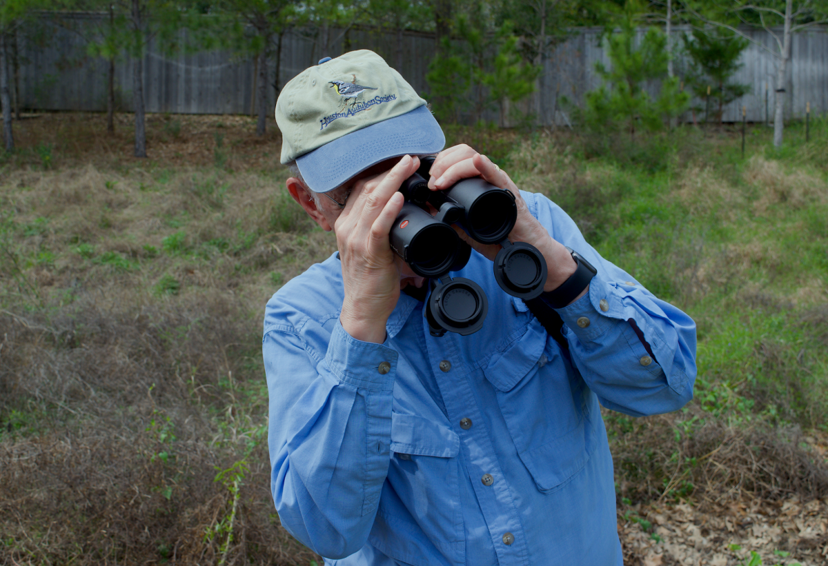 Mr. Gary Clark observes the 1.5-acre site on Kinkaid’s campus and looks through his binoculars as he follows the sound of a Swamp Sparrow. “Every bird has its own unique vocalizations,” Mr. Clark said.