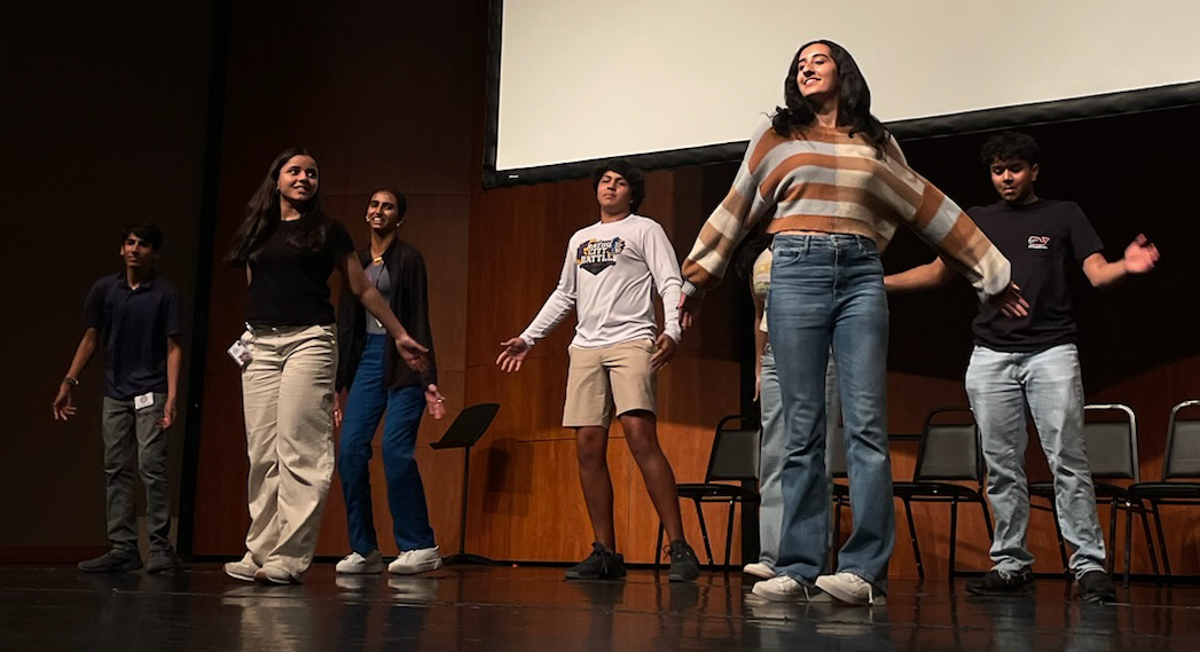 Members of Kinkaid’s South Asian Heritage Club perform “Mauja Hi Mauja,” a dance from the movie “Jab We Met.” “I really enjoyed being able to showcase my culture,” senior Kaveen Shah said.