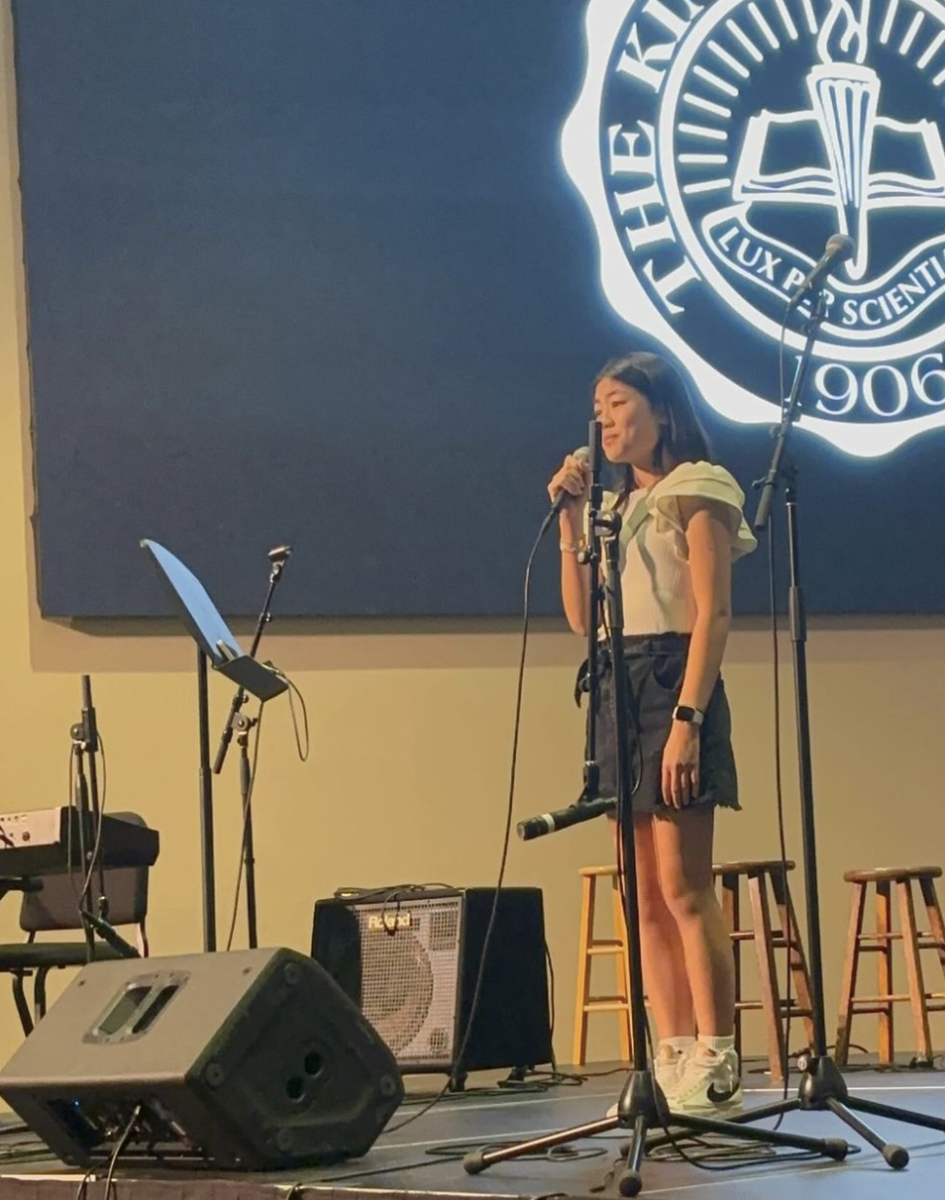 Sophomore Maureen Min sings at Coffeehouse.