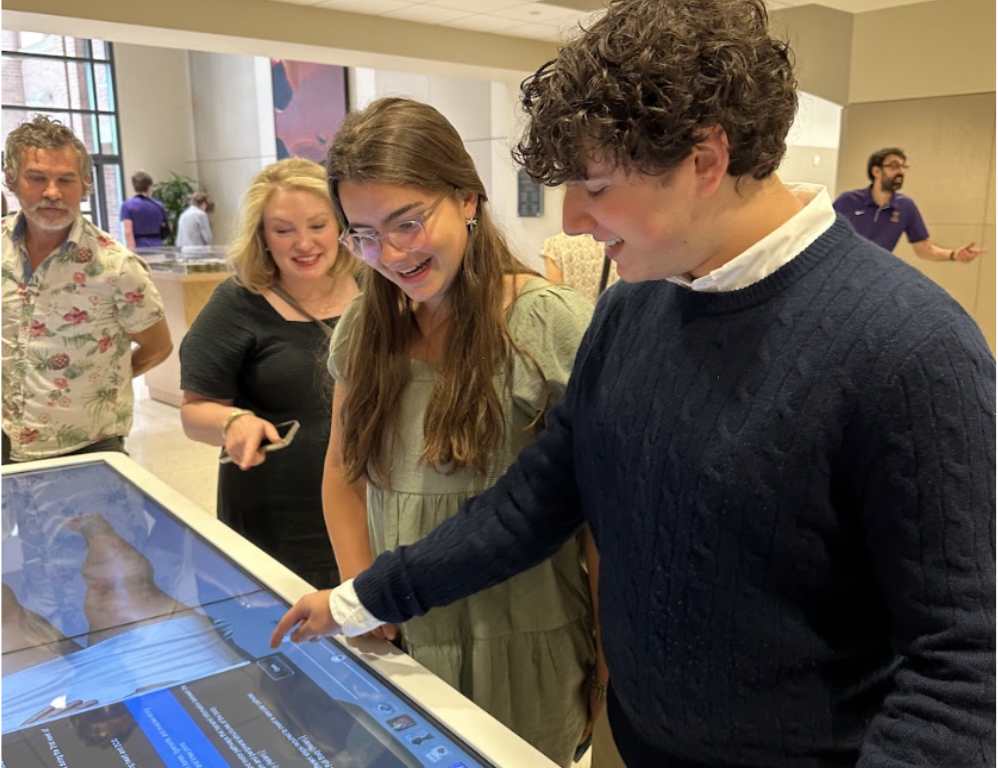 Sophomores Kendall Adam and Henry Wise explore the Upper School Anatomage. The Anatomage table includes state of the art technology to perform 3D dissections and models of human anatomy.
