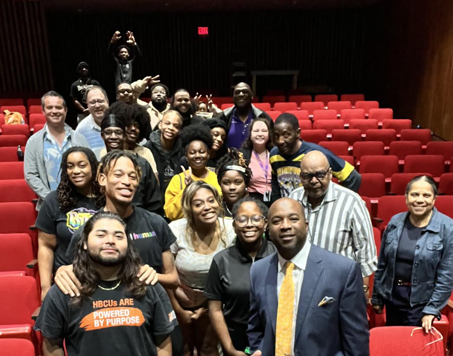 Mr. Charles Harrison (bottom right) poses with students at Prairie View A&M after his talk on April 25.