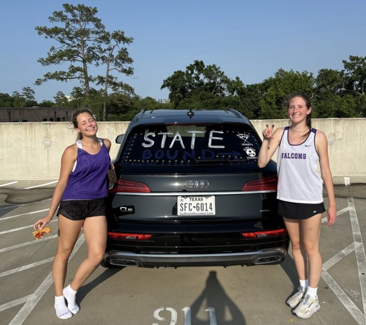 Varsity players participating in painting each others cars with window markers after a fun practice. Some cars said “state bound,” and “go kinkaid varsity lacrosse.” The Swanson family provided pizza for the team.   
