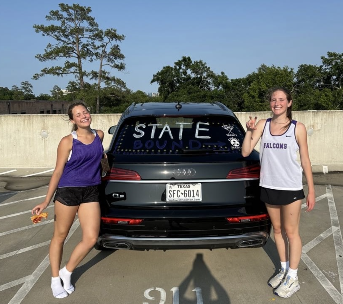 Varsity players participating in painting each other's cars with window markers after a fun practice. Some cars said “state bound,” and “go kinkaid varsity lacrosse.” The Swanson family provided pizza for the team.   