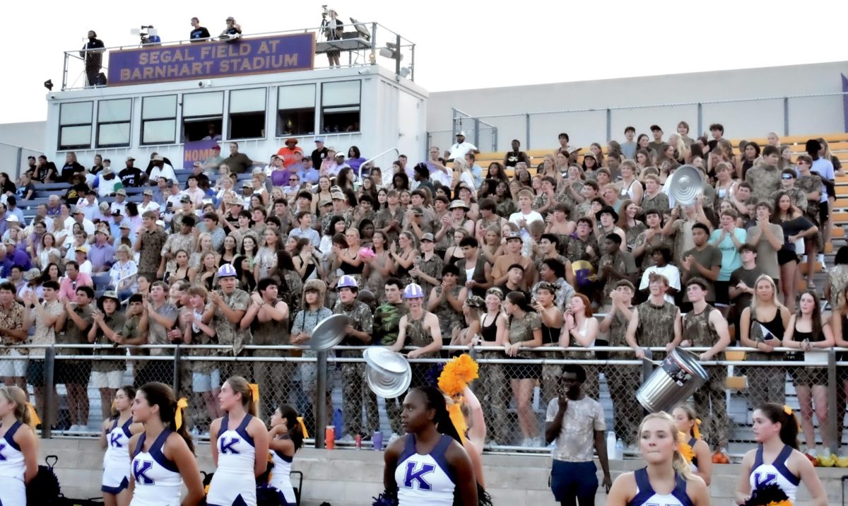 Kinkaid students packed the stands at Segal Field, dressed in camouflage and banging trash can lids to cheer on the Falcons during the Thursday night game against Gunter.