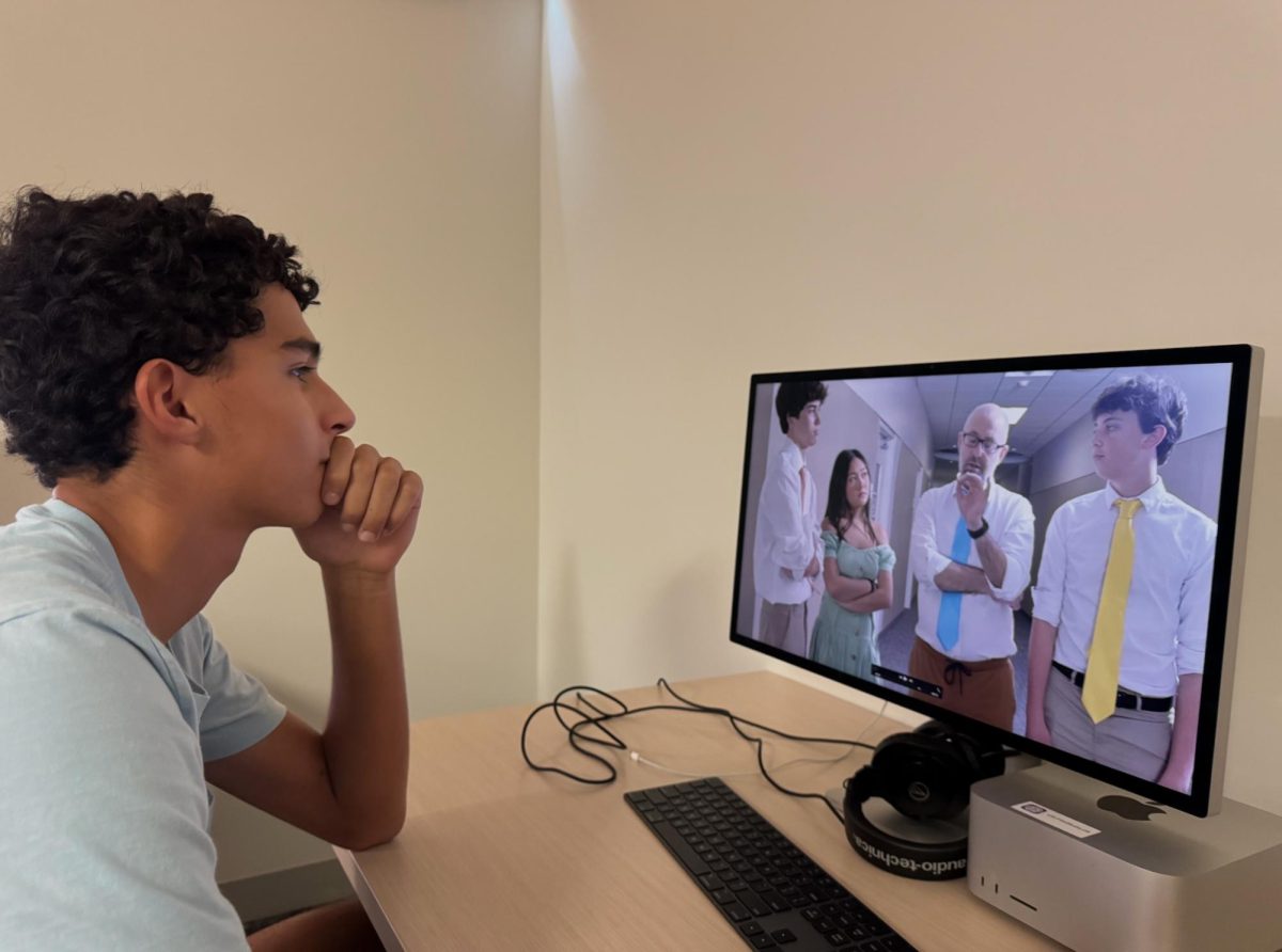 ​​Focused on perfecting every frame, junior Michael Akin edits his film project during his advanced film class. Earlier this semester, he wrote, directed and filmed his project, showcasing his creativity and technical skills behind the camera.
