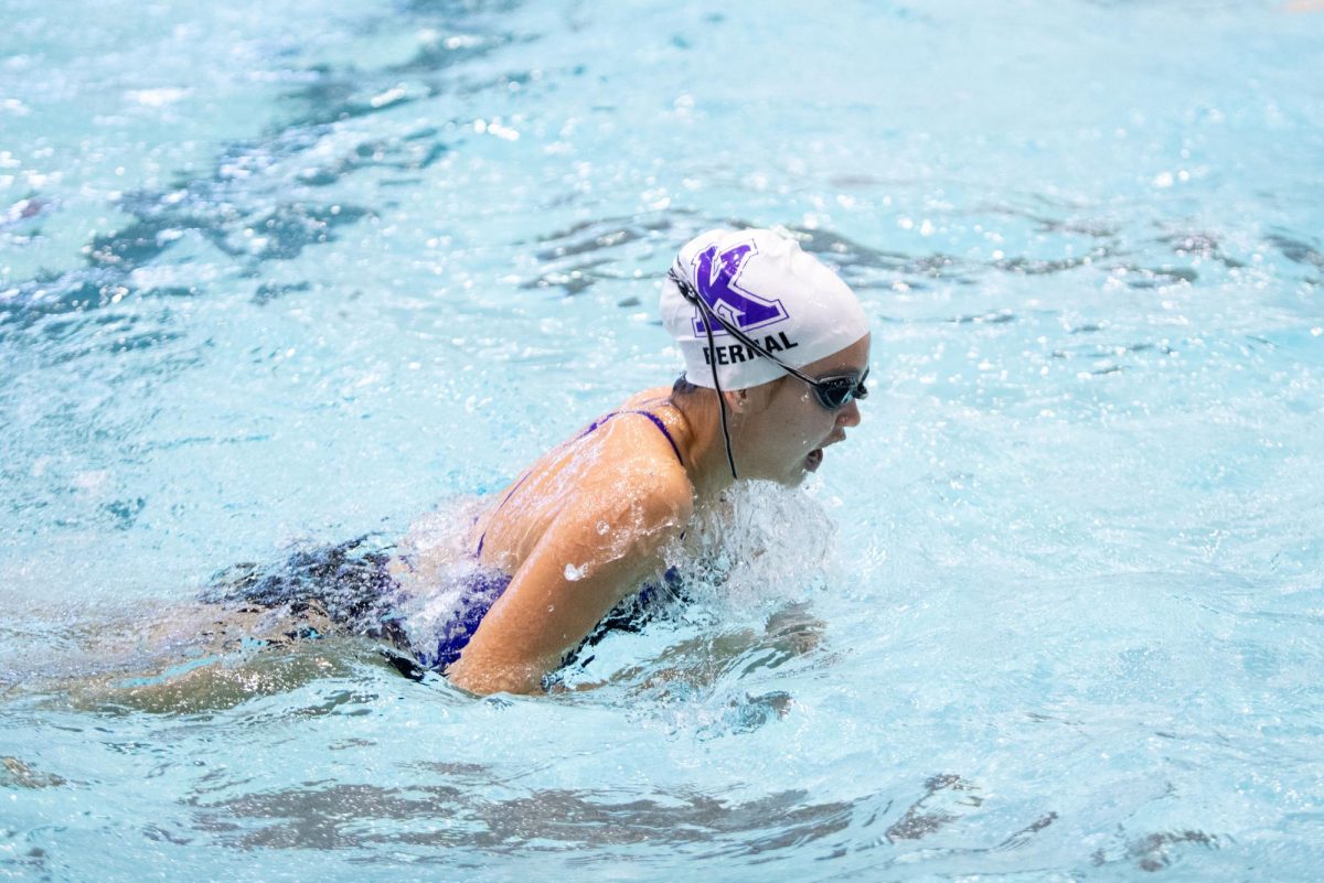 Junior Maya Bernal competes for Kinkaid Swim at the HAPPI Meet.