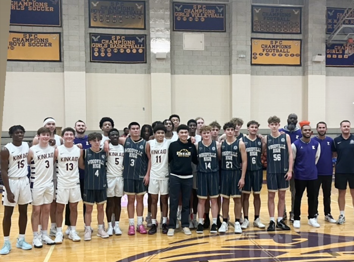 The boys varsity basketball team gathers at center court for a post-game photo with the Woodville basketball team from Australia, celebrating a rare international matchup. “It was definitely fun playing a team from another country,” sophomore Reid Wright said. “They moved the ball in ways I hadn’t really seen before. After the game, they gave us keychains, took pictures with us, and showed great sportsmanship. No other team has really done that, so it meant a lot.”