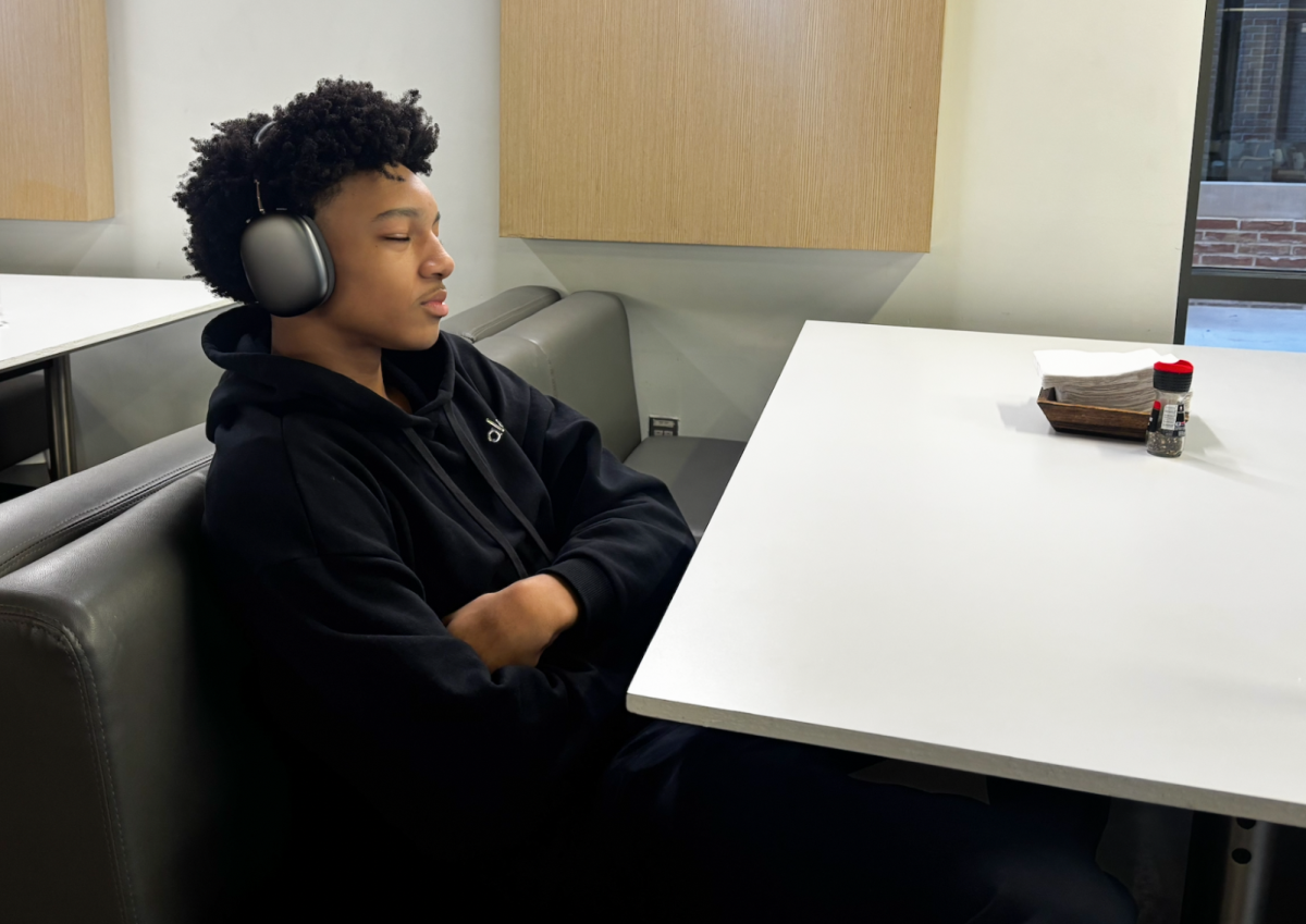 Junior Maddox Davis listens to music in the Sarofim Dining and Learning Center ahead of a home basketball game. He used the space to relax and focus before tipoff. “Listening to my favorite music before a game gets me hyped and fully locked in," he said. "The DLC gives me a calm place to relax and focus before it’s game time,” he said