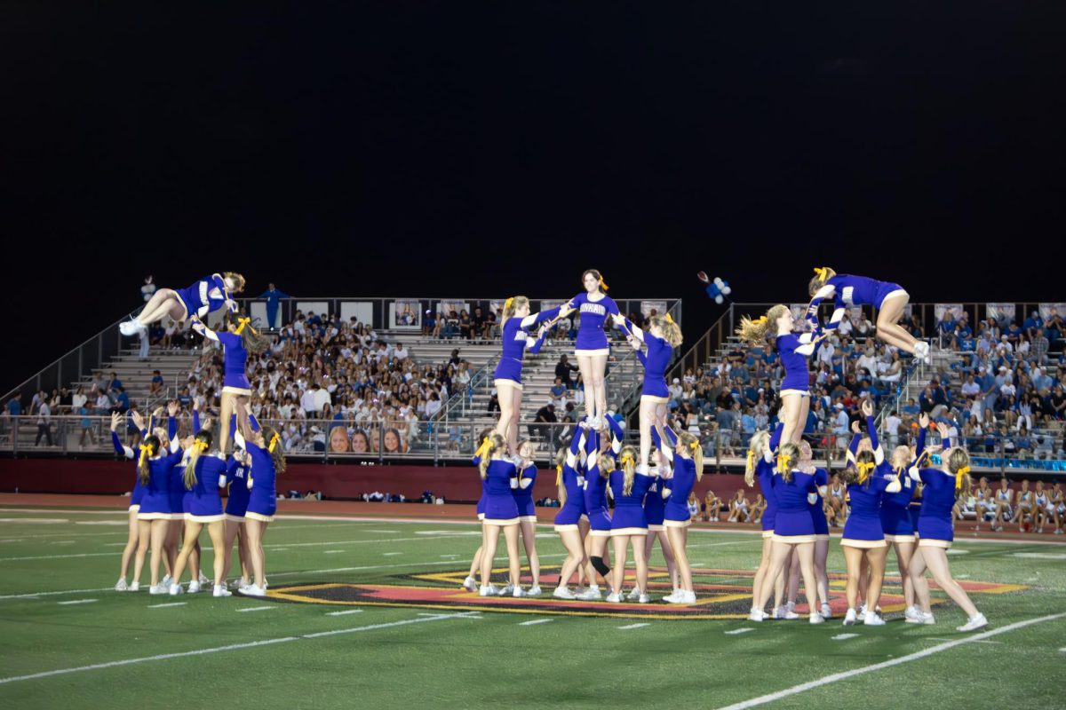 Kinkaid's varsity cheerleaders perform at the 2026 Southwest Preparatory Conference championship game. The cheer program will be undergoing changes as interest has peaked. One change includes allowing freshmen to try out for varsity.