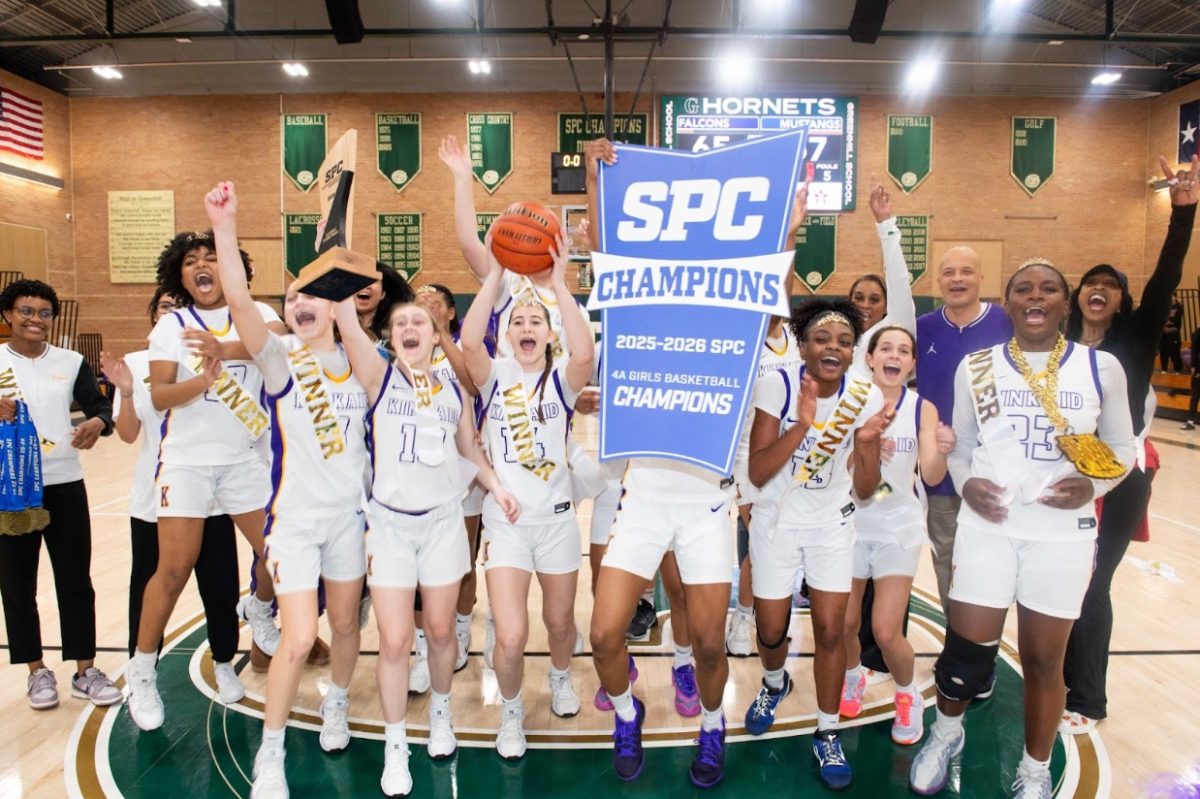 The Kinkaid Girls’ Basketball Team celebrate winning their second consecutive SPC title. “I was very jubilant and I was just so excited to win another championship with my team,” said Junior Lauren Hull. 