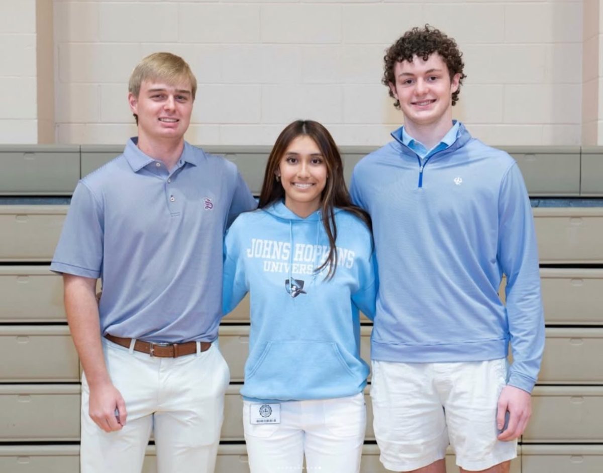 Seniors Jackson Setrum, Jasmine Nyugen and Carlton Walton take a picture together before their signing ceremony. Jackson will be playing division 3 baseball at Sewanee University, Jasmine playing tennis at Johns Hopkins, and Carlton pursuing baseball as well at Washington and Lee. “I am super excited for this opportunity and hope to grow as a person and as an athlete”, said Jasmine. 