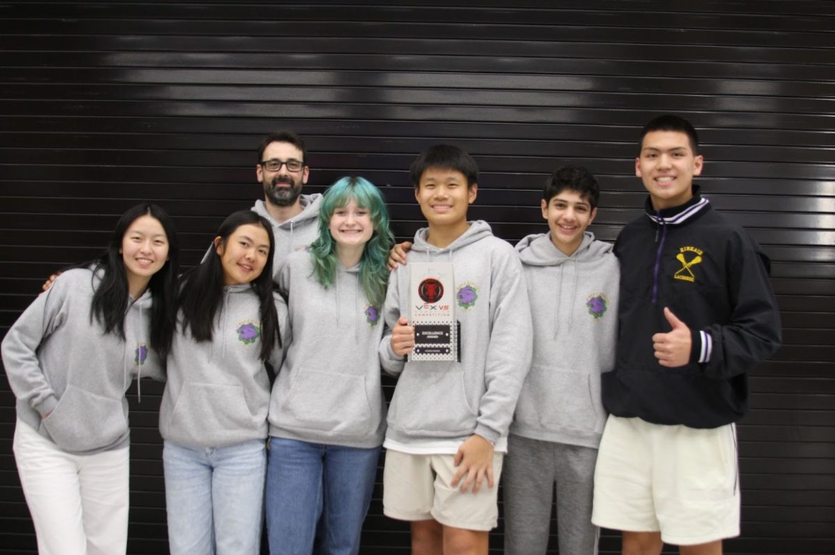 The Robotics Team, after their performance at regionals, is posing with the Excellence Award. “I was pretty happy with the award, but I was also exhausted after the long day,” freshman Ruhaan Talreja stated. 