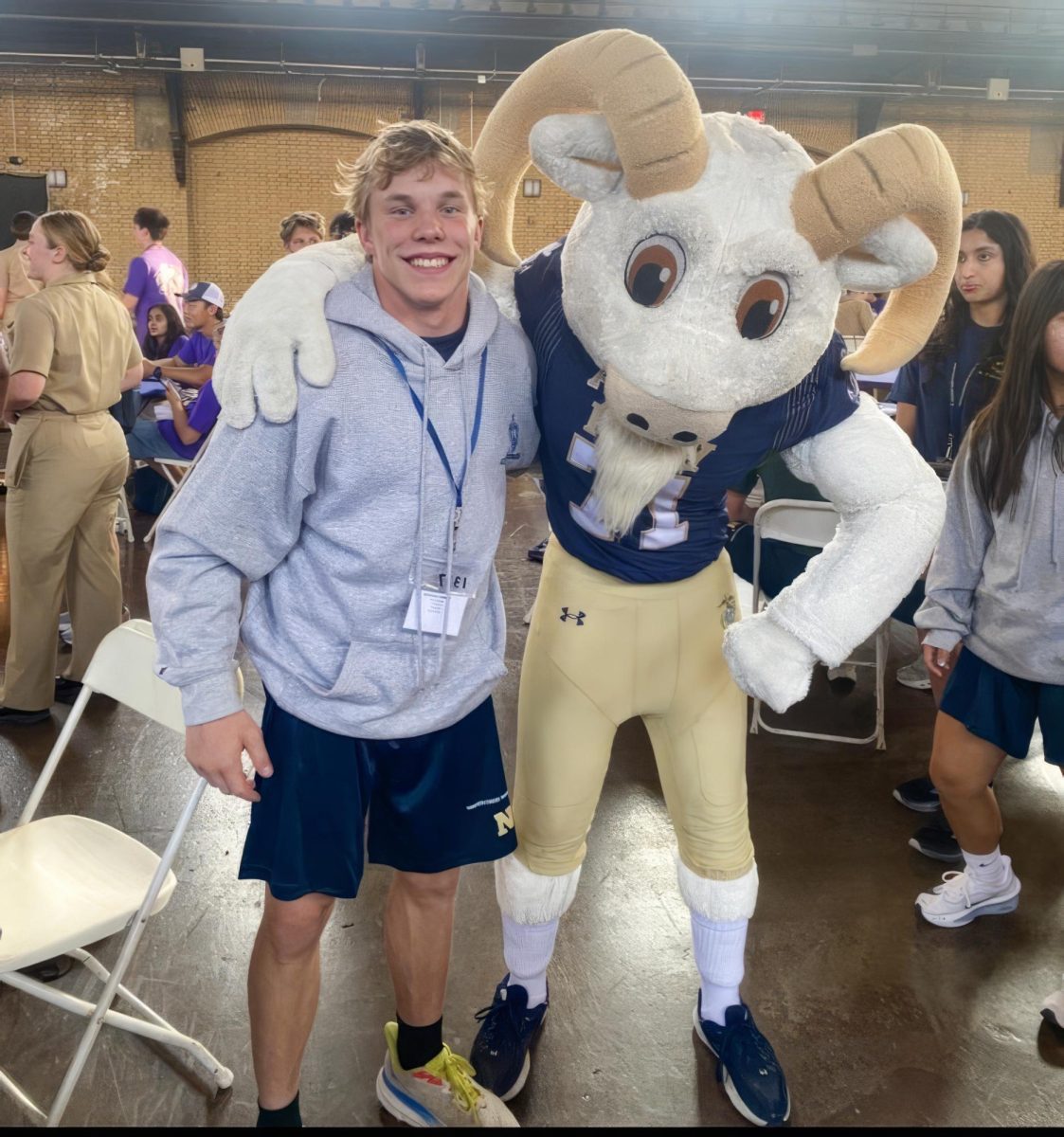 Senior Morgan Tannery poses with Bill the Goat, the United States Naval Academy's mascot and good luck charm. The tradition began with a pet goat, named "El Cid," who accompanied sailors and was brought to the 1893 Army-Navy football game, where the team won.